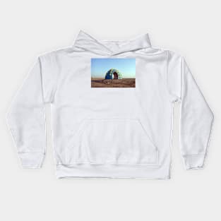 a beach sunshade Kids Hoodie